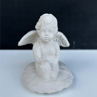 Cherub On Pillow